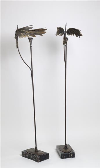 PAUL WUNDERLICH Two winged candle stands.